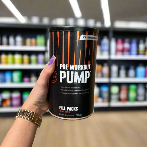 Close-up of (Animal Pump 30 Packs) held up inside My Supplement Shop, clearly showing the front label in a Sports Nutrition setting.