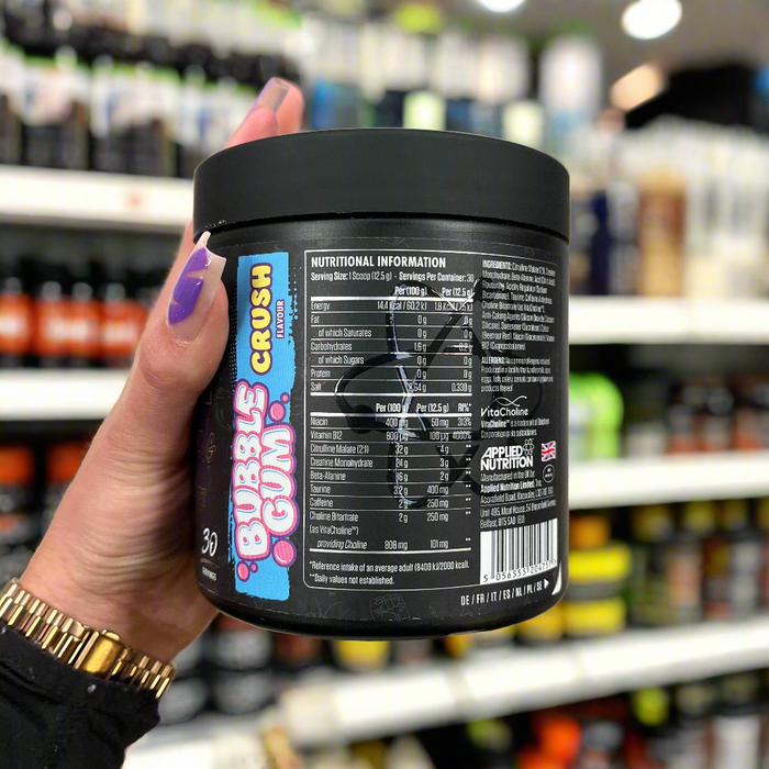 Close-up of (Applied Nutrition ABE Ultimate Preworkout 315g) held up inside My Supplement Shop, clearly showing Nutritional Values on the packaging in a Sports Nutrition setting.