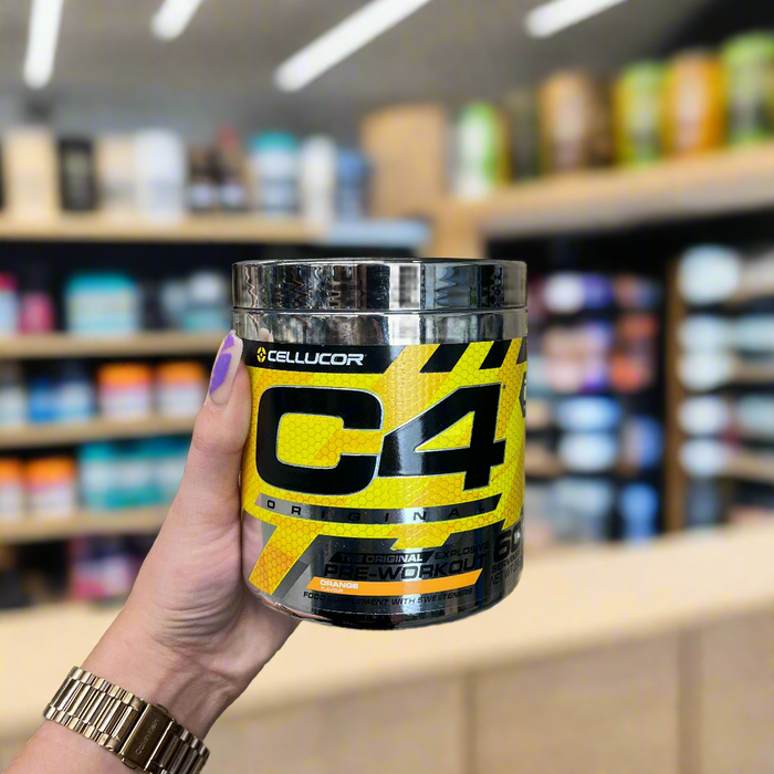 Close-up of (Cellucor C4® Original Pre-Workout) held up inside My Supplement Shop, clearly showing the front label in a Sports Nutrition setting.

